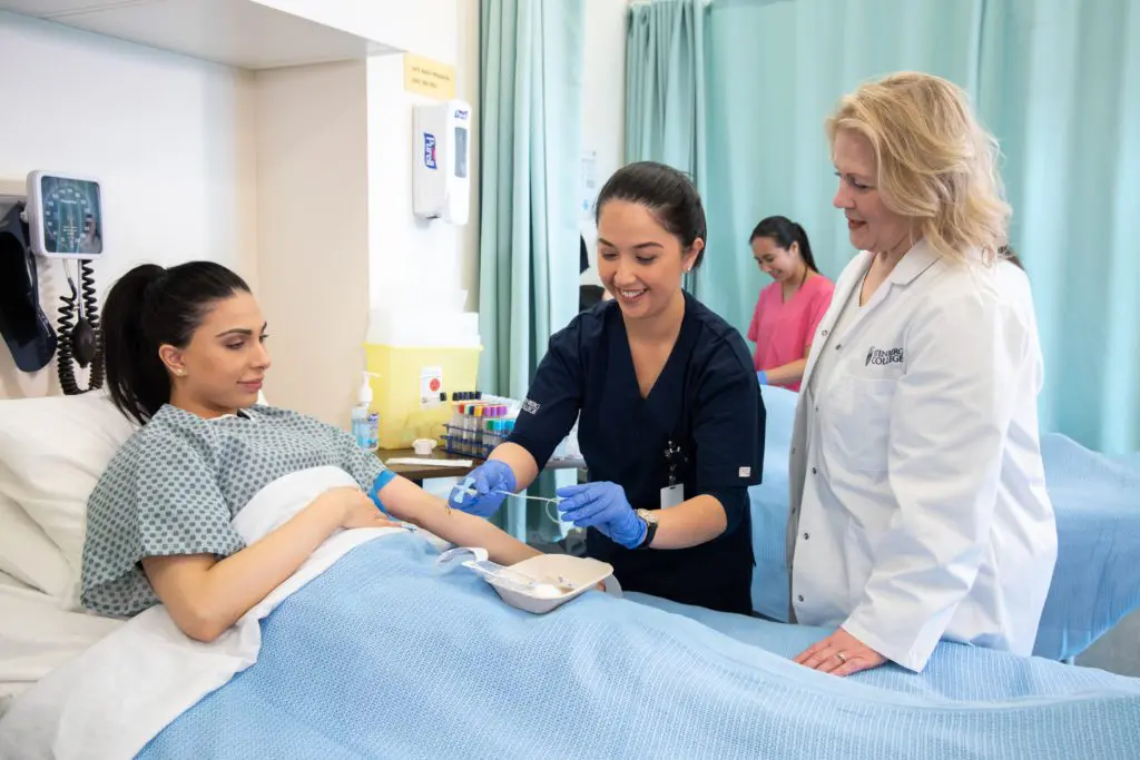 Become a Medical Lab Assistant (MLA) Two students and an instructor participating in an MLA lab