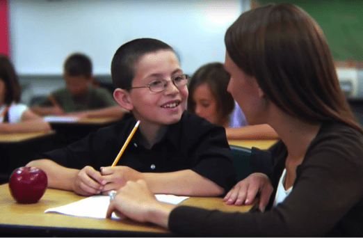 Education Assistant helping a child. Being and Educational Assistant can be challenging, but the rewards are life changing.