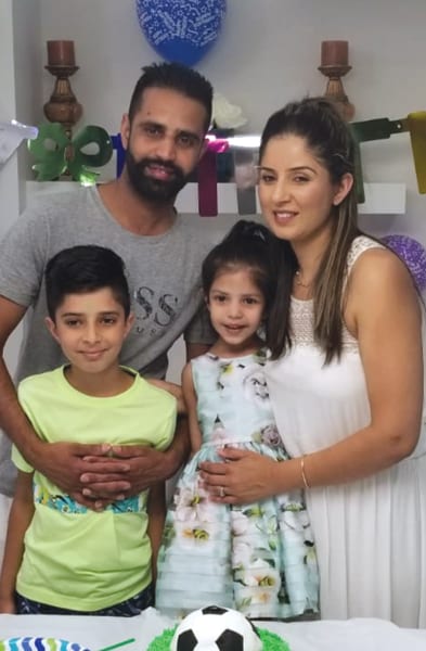 Harpreet, husband and children. They've all supported her through her dream of becoming a NUC.