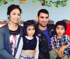 Nelofar with her family. They supported her through the program and she is now a Practical Nurse.